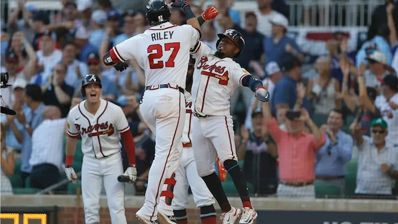Austin Riley hitting a home run during the Braves Phillies Game 1