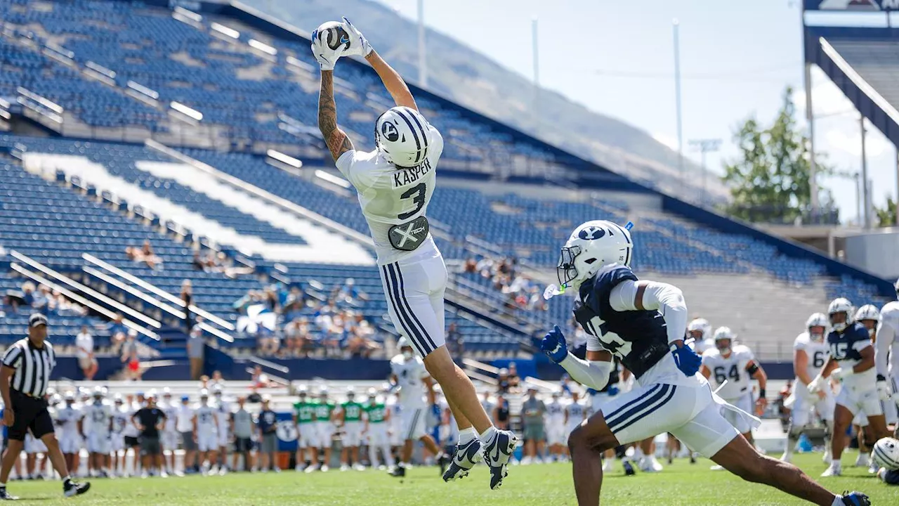 BYU Football 2025 quarterback throwing a pass during the season opener