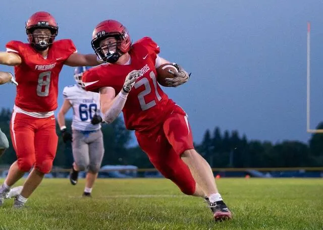 Devils Lake Football 2024 Firebirds running back Egan Laite breaks away for a touchdown against Wahpeton