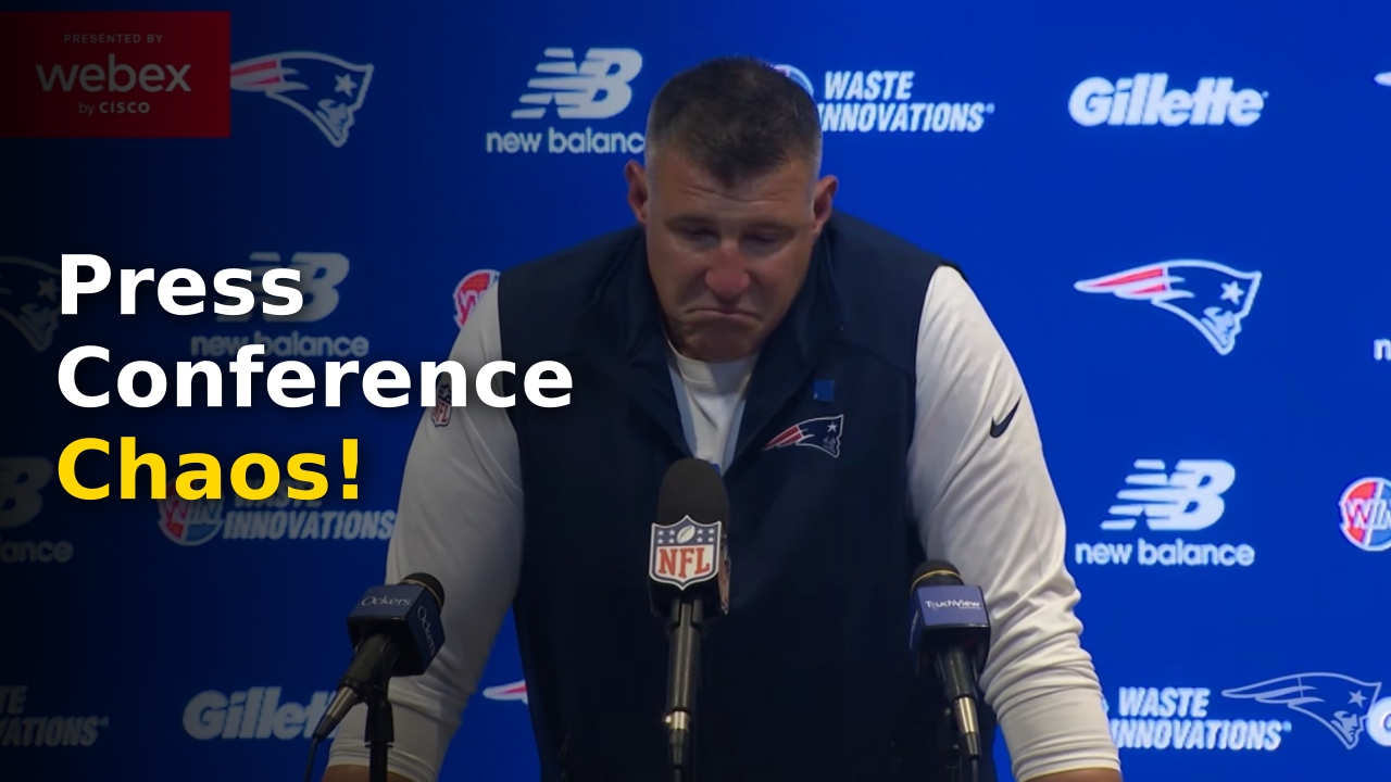 Mike Vrabel speaking at the podium during a 2026 NFL press conference