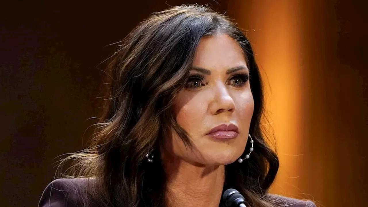 Portrait of Kristi Noem during a formal political hearing