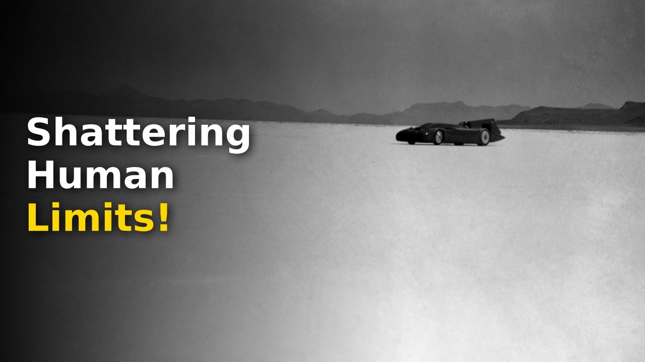 Sir Malcolm Campbell posing proudly beside his record-breaking Blue Bird land speed record vehicle