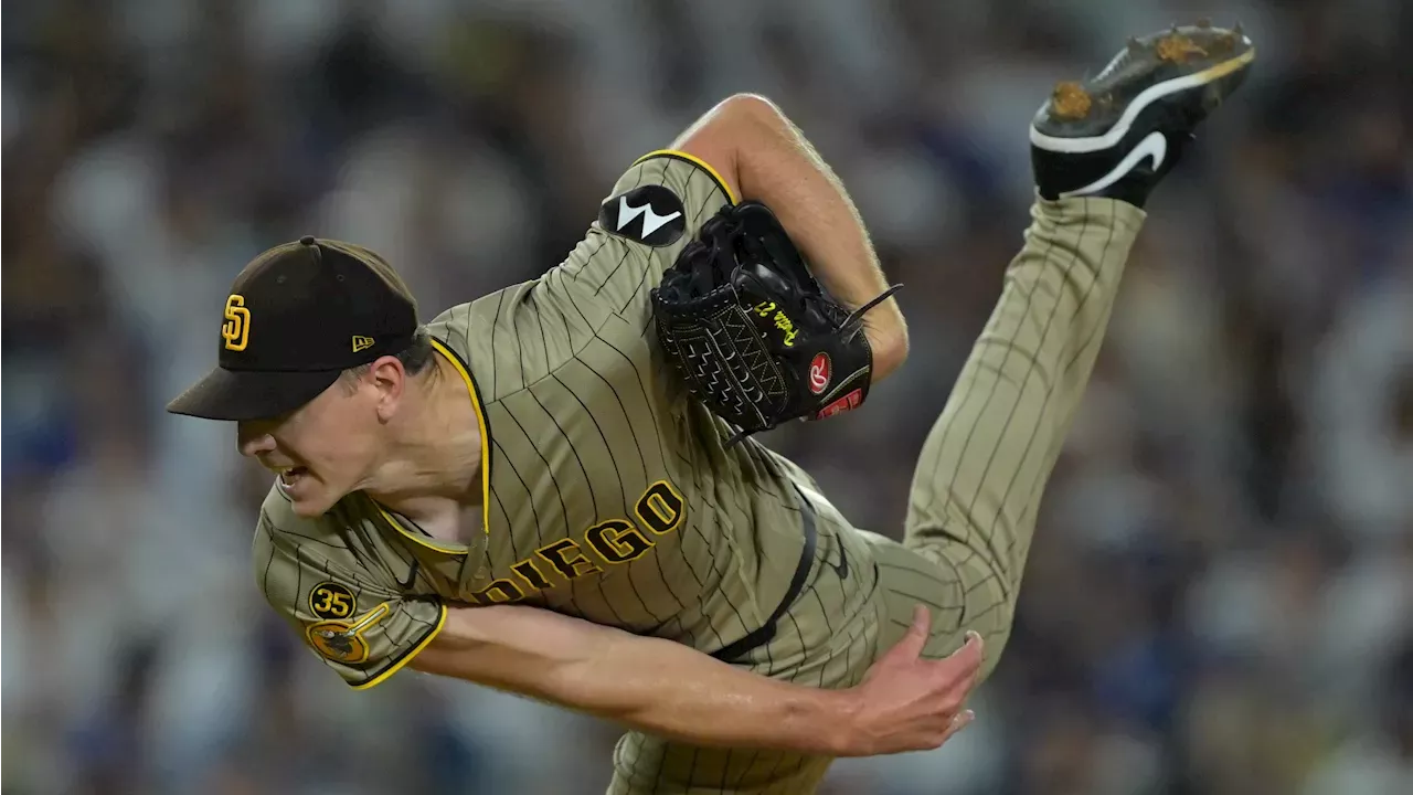 The San Diego Padres celebrate their 2026 postseason qualification at Dodger Stadium