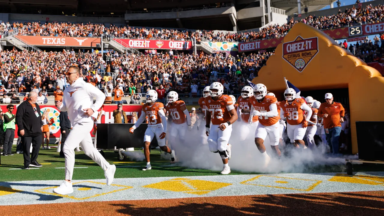 The Tennessee vs Texas college football logo graphic