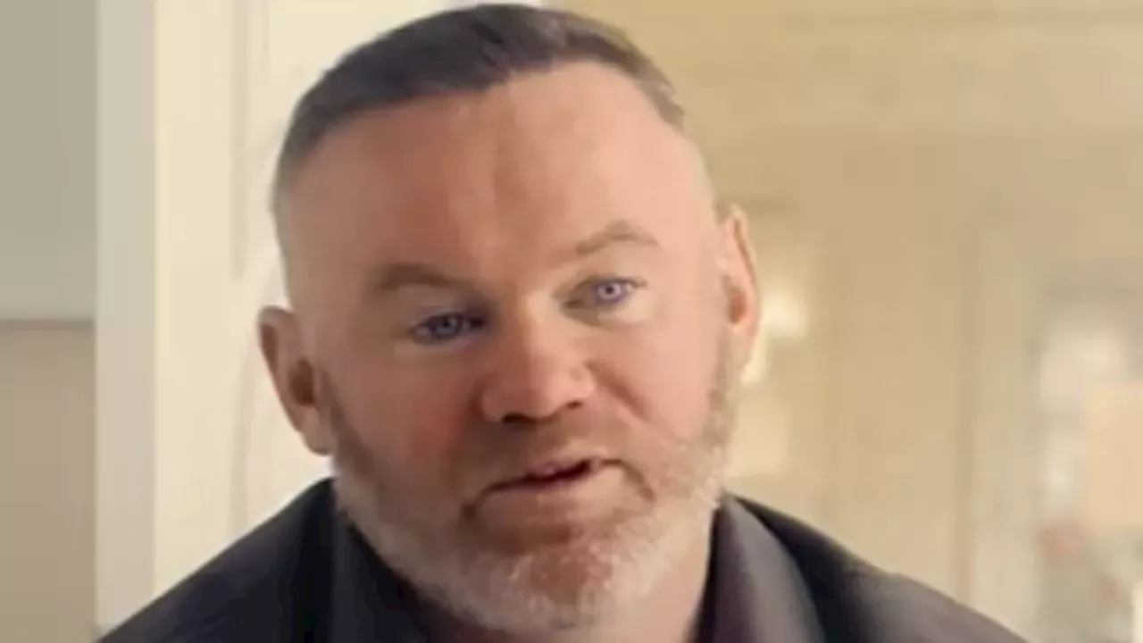 Wayne Rooney showcasing his new nose job and slimmer physique at a public event