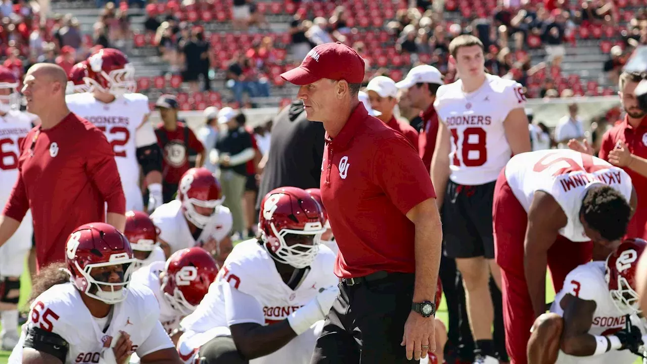 Brent Venables celebrating a victory with Oklahoma football players in 2026