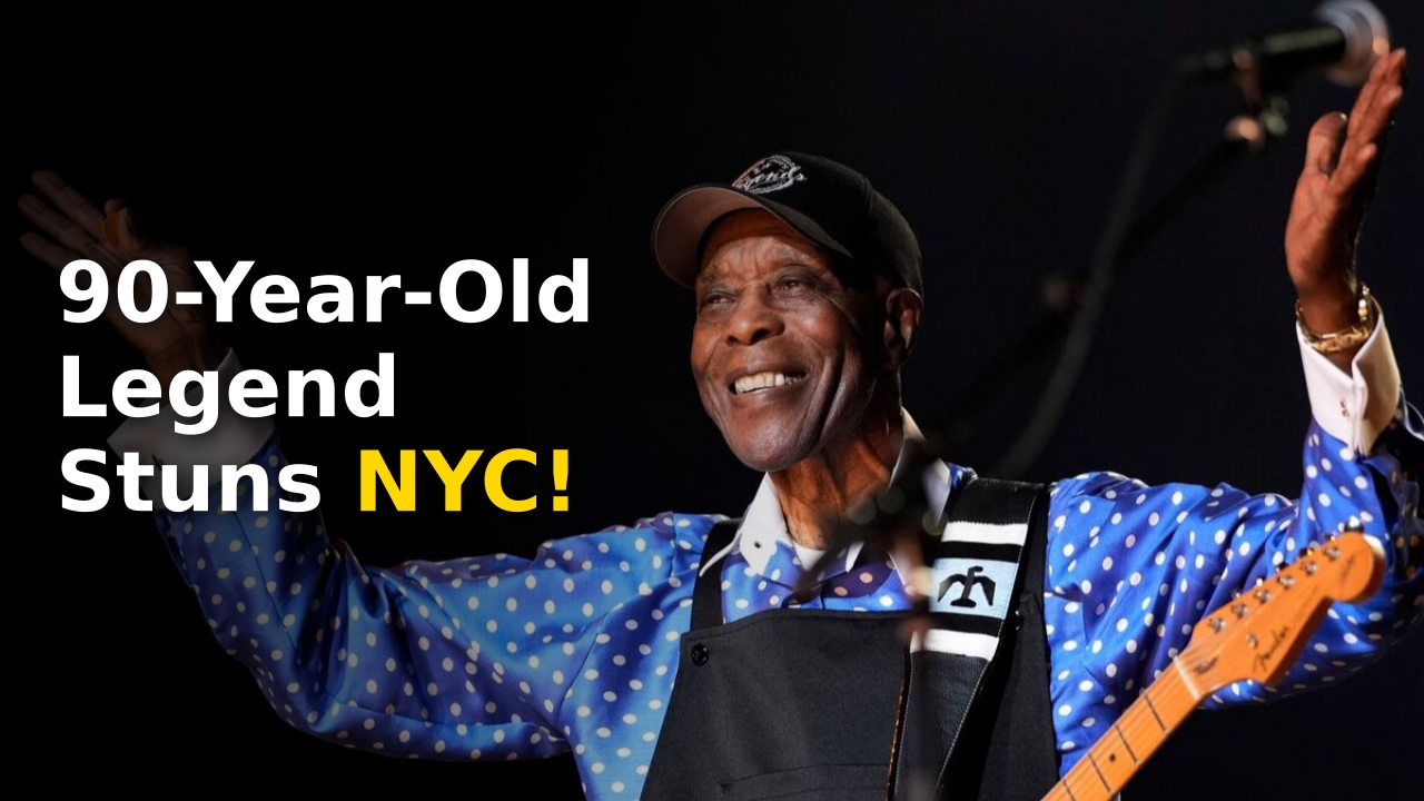 Buddy Guy smiling on stage at Radio City Music Hall during his 90th birthday celebration