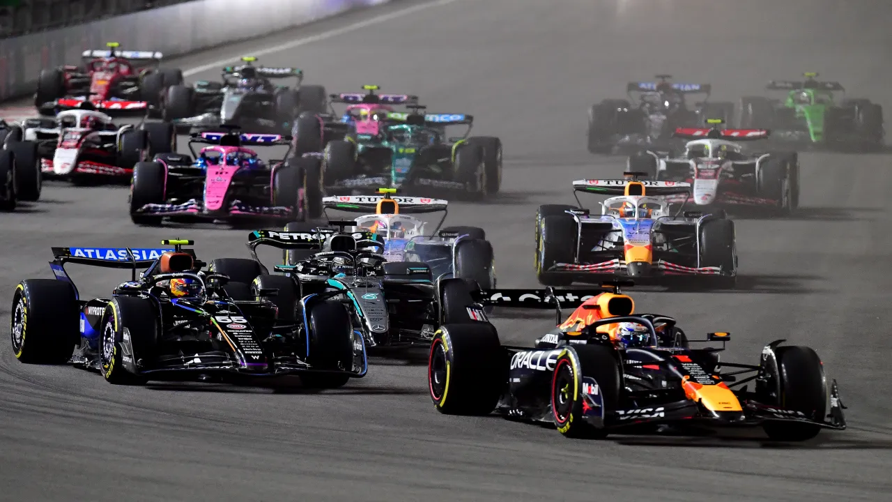 Formula 1 cars racing under the lights at the Singapore Grand Prix 2026