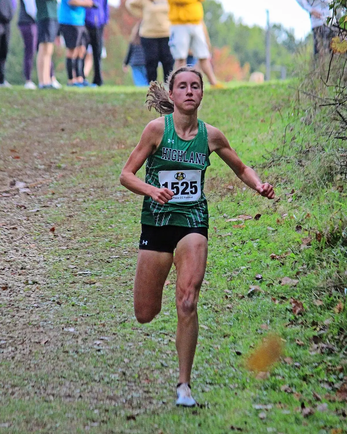 Highland runner Katie Schuler winning the Milt Place Festival cross country race