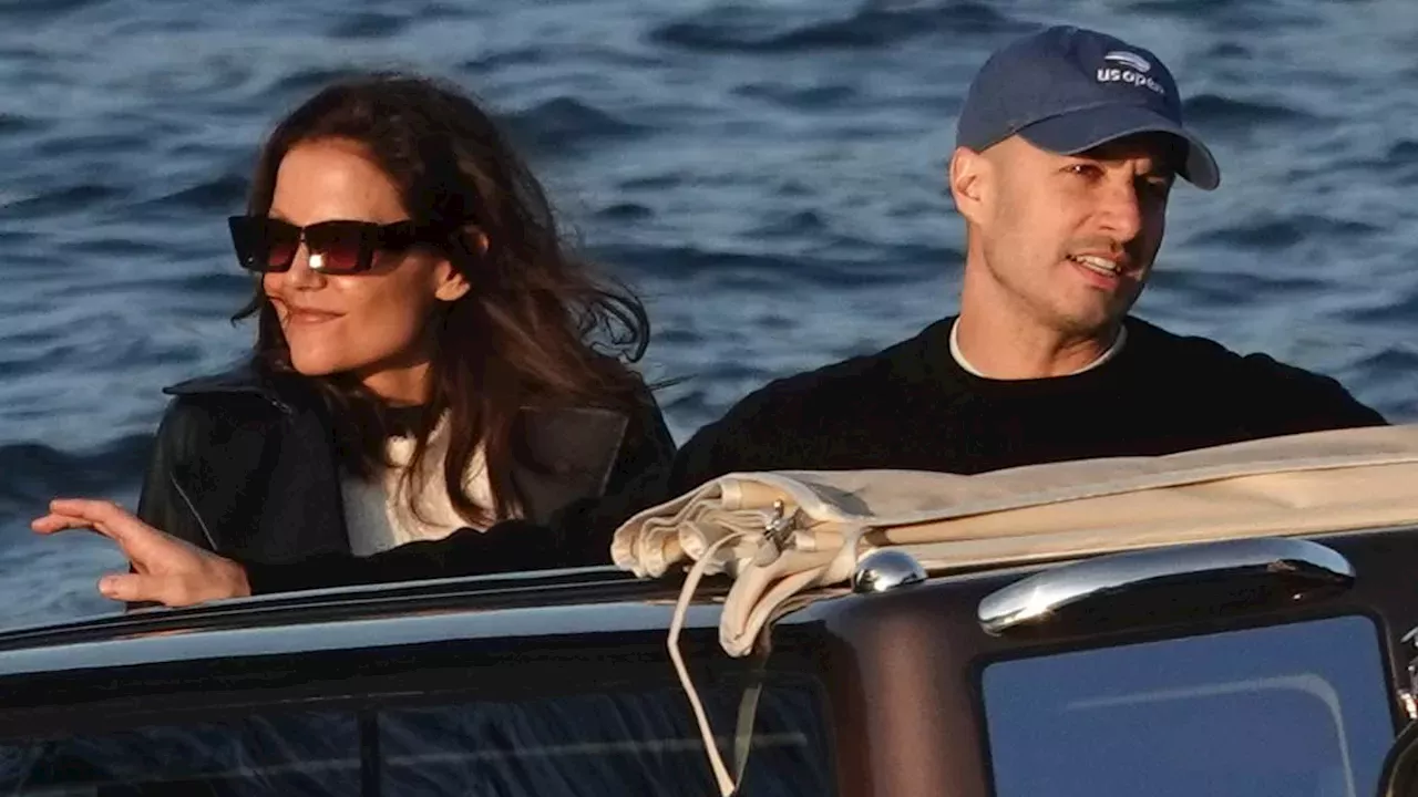 Katie Holmes and Jason Bard Yarmosky enjoying a romantic sunset cruise on Lake Como