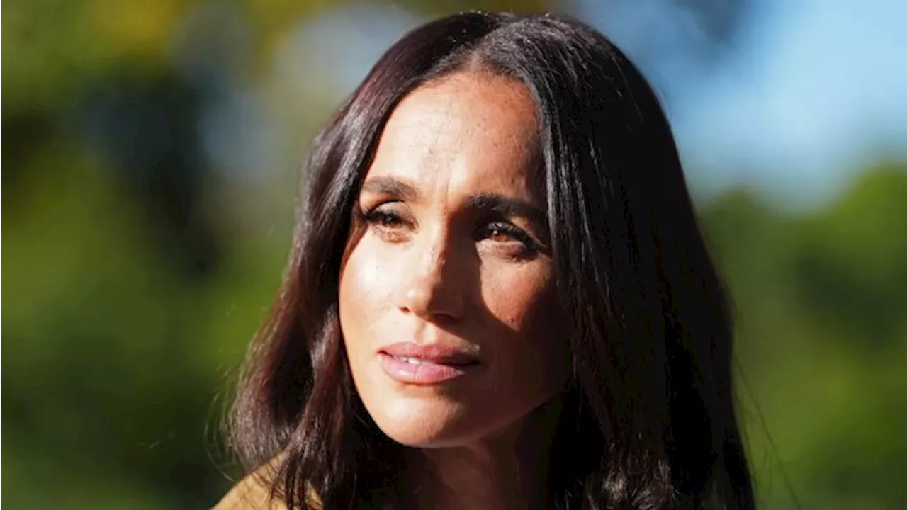 Meghan Markle speaking at a panel discussion during her partnership with WME