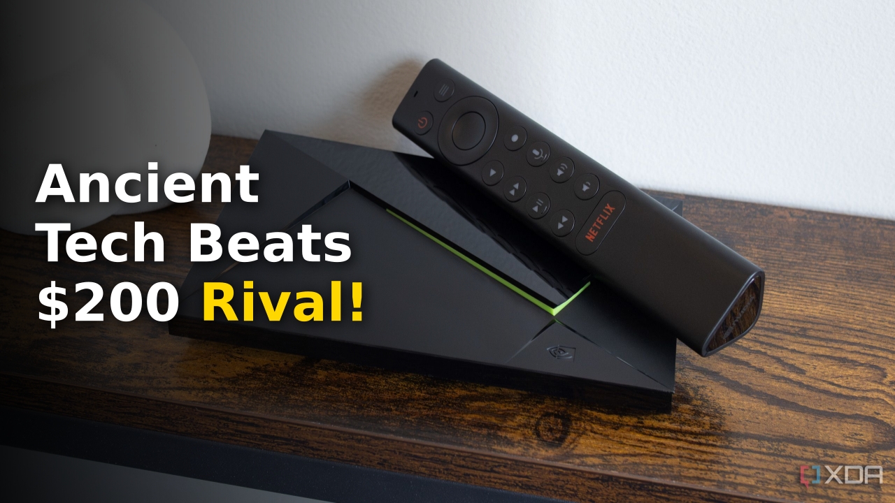 Nvidia Shield TV streaming box next to its sleek triangular remote control
