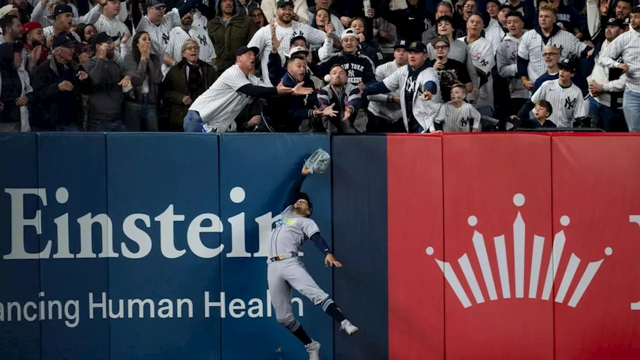 Rays players celebrating on the field after defeating the Yankees in the Yankees vs Rays ALDS 2026