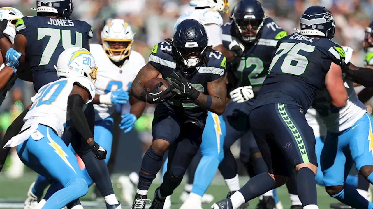 Seahawks players celebrating a victory after a hard-fought game in the 2026 NFL season