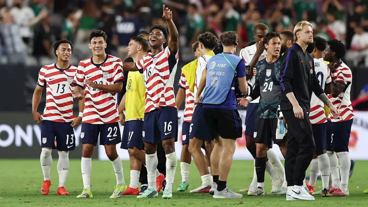 USMNT players celebrating a goal during their historic USMNT Mexico victory